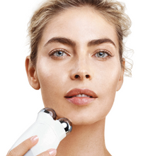 Load image into Gallery viewer, women using NuFACE trinity pro