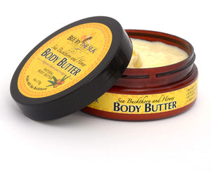 Bee by the sea body butter open tub showing lotion