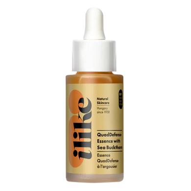 Quad Defense with Sea Buckthorn Essence Serum in a stopper bottle
