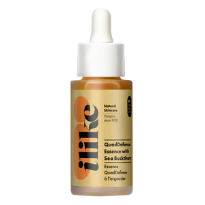 Quad Defense with Sea Buckthorn Essence Serum in a stopper bottle
