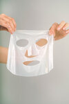 Hadaka-Lucent-Veil-Mask held by hands