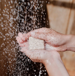 The unscented company shampoo bar in use